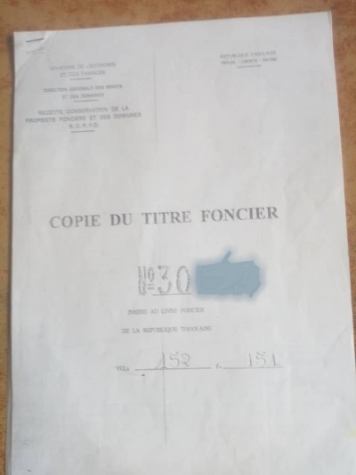 1 lot cloturé avec titre foncier