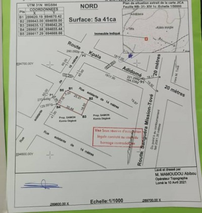 1 lot avec titre foncier en cours à 1km du grand rond point