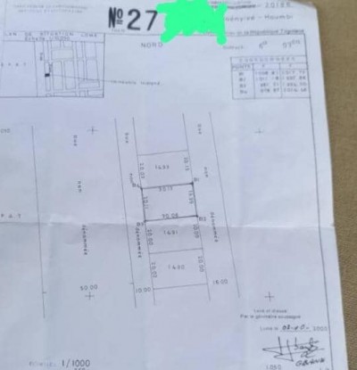 1 lot cloturé avec titre foncier