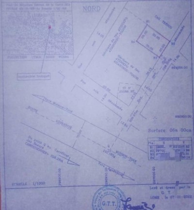 1 lot cloturé avec titre foncier en cours à 600m du contournement