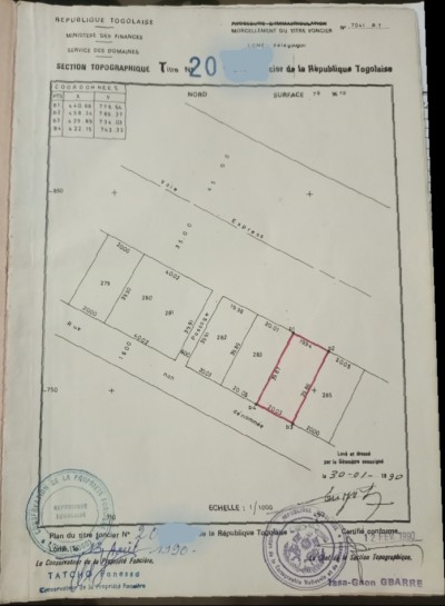 1 lot 1/4 cloturé avec titre foncier au bord de l'échangeur