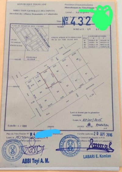 1 lot cloturé avec titre foncier