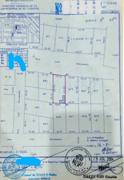 1 lot et démi cloturé avec titre foncier au bord du goudron
