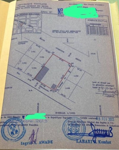 4 lots collés cloturés avec titre foncier au bord du goudron