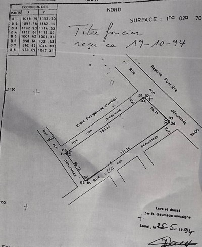 13 lots collés avec titre foncier à 200m du goudron