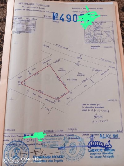 8 lots collés cloturés avec titre foncier à 50m du goudron