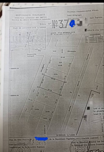2 lots collés avec titre foncier au bord du goudron