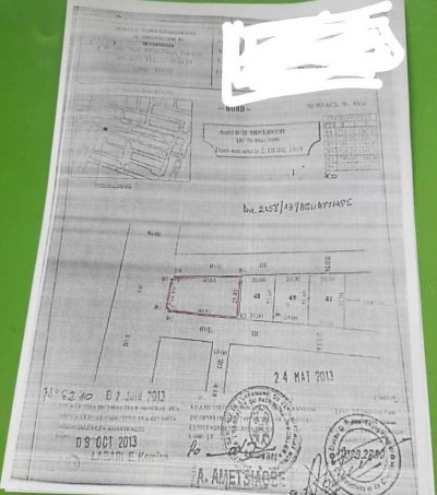 2lots collés cloturés avec 3 tampons dans la réserve d'agoè
