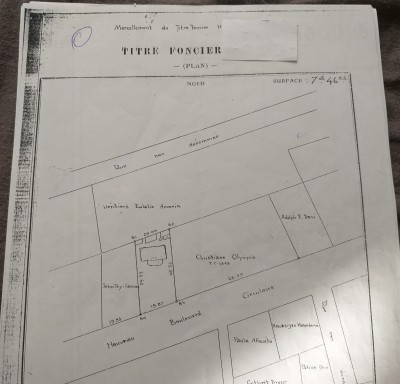 1 lot 1/4 cloturé avec titre foncier au bord du boulevard 13 janvier