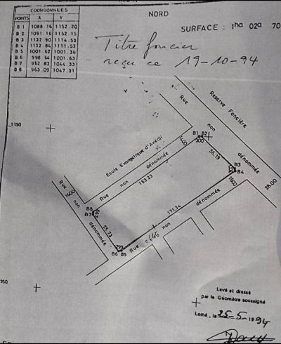 13 lots collés cloturés avec titre foncier à 150m du goudron