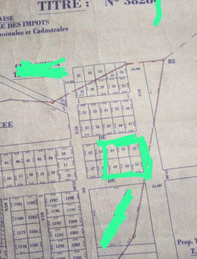 6 lots collés avec titre foncier au bord du goudron