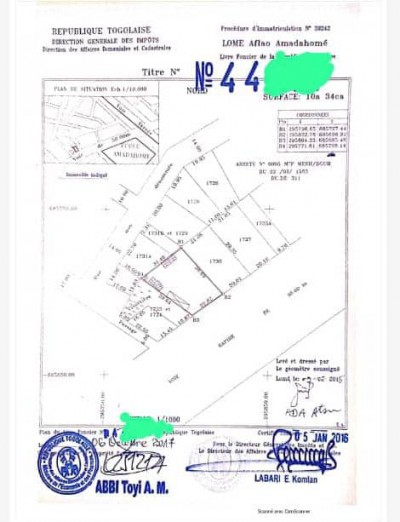 1 lot 3/4 cloturé avec titre foncier  à 50m du goudron