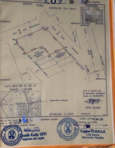 3 lots et démi collés avec titre foncier à 400m du goudron