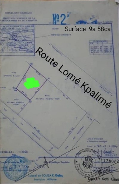 1 lot 3/4 cloturé avec titre foncier au bord du goudron