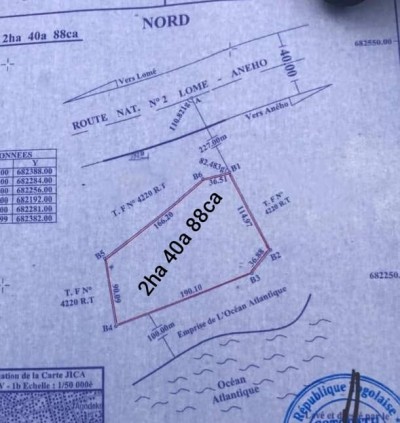 75 lots collés ( 5 h 60a ) avec titre foncier à coté hotel tropicana