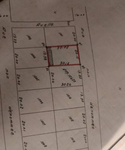 1 lot avec titre foncier à 300m du goudron
