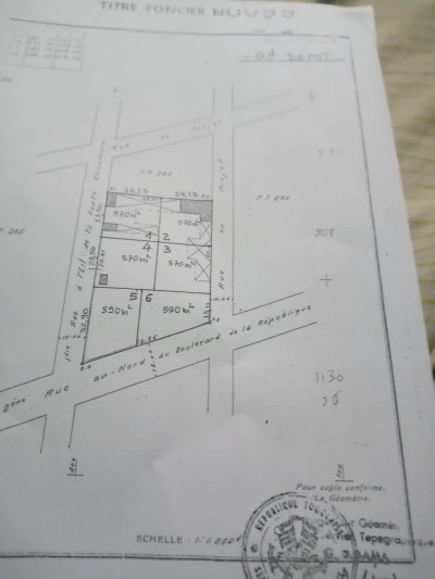 6 lots collés cloturés avec titre foncier à 100m du goudron