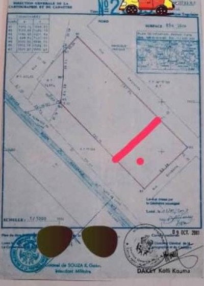 2 lots collés avec titre foncier au bord du boulevard