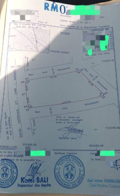 10 lots collés avec titre foncier au bord  du goudron