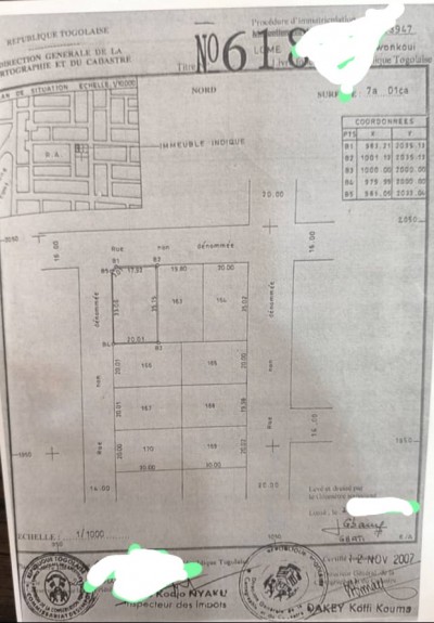 1 lot 1/4 cloturé avec titre foncier à 300m du goudron