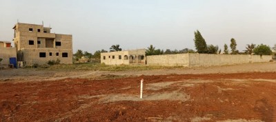 10 lots collés avec titre foncier en cours à 700m du goudron