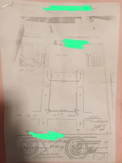 10 lots collés cloturés avec titre foncier à 250m du goudron