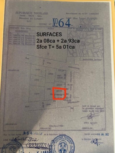 3/4 de lot cloturé avec 2 titres foncier à 150m du goudron