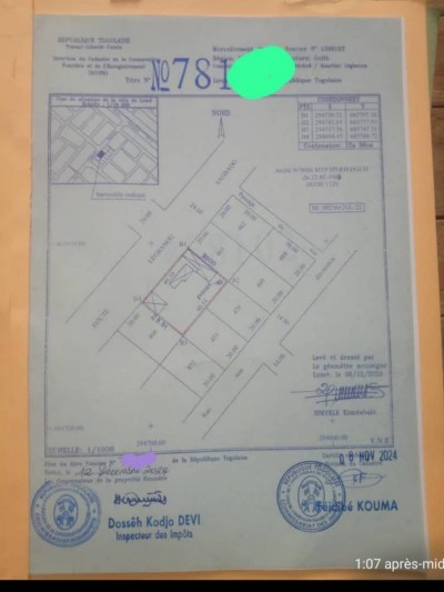 1 lot avec titre foncier au bord de la grande voie