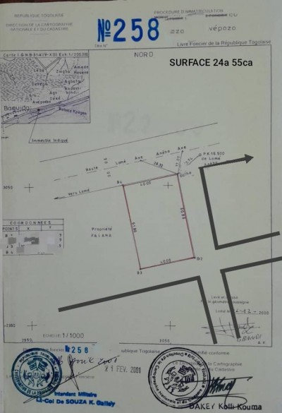 4 lots collés cloturés avec titre foncier au bord du goudron