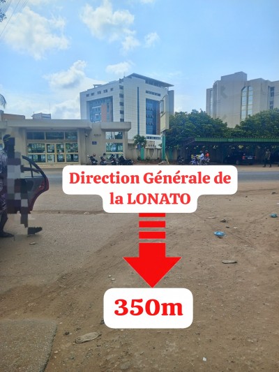 1 lot cloturé avec titre foncier en cours + 10pièces à démolir