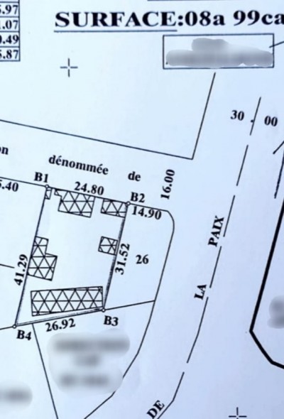 1 lot et démi cloturé avec plan visé otr à 15m du goudron