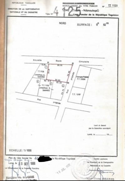 1 lot et démi avec titre foncier au bord du goudron