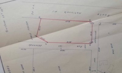 10 lots collés avec titre foncier au bord du goudron nationale 1
