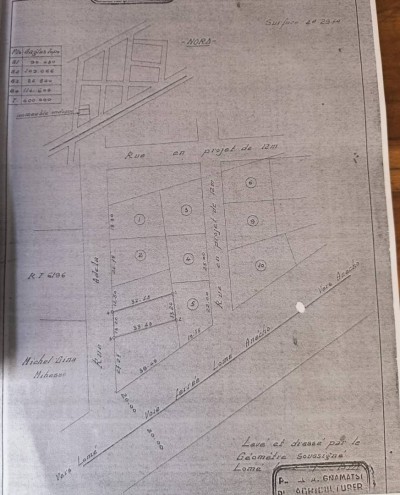 3/4 de lot avec plan + mandat notarial au bord du goudron