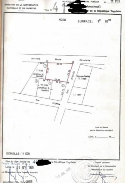 2 lots et démi avec titre foncier au bord du goudron