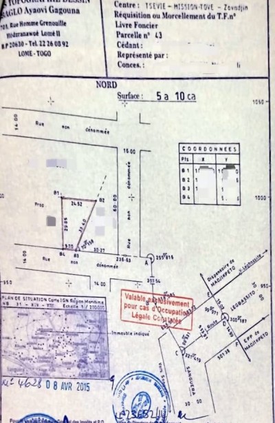 1 lot avec titre foncier en cours à 600m du goudron