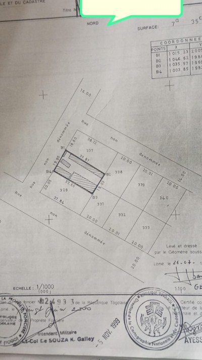 1 lot 1/4 avec titre foncier à 150m du goudron