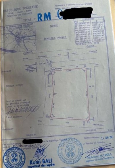 8 lots et démi collés avec titre foncier à 100m du goudron