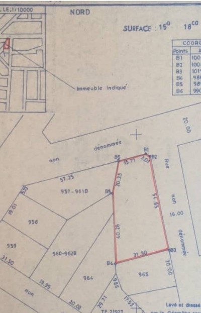 2 lots et démi collés avec titre foncier à 50m du goudron