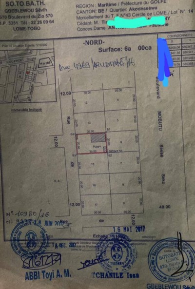 1 lot cloturé avec 3 tampons + constructions à 90m du goudron