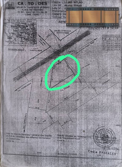 2 lots collés avec titre foncier en cours au bord du goudron