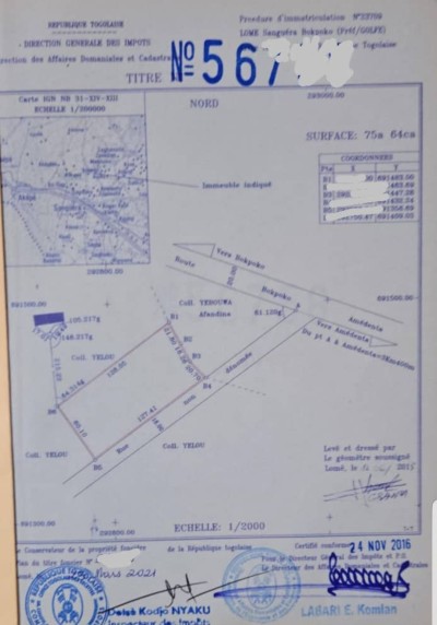 12 lots collés cloturés avec titre foncier à 500m du goudron