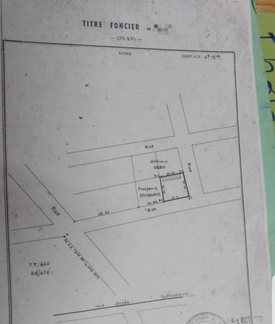3/4  lot cloturé avec titre foncier à 60m du goudron
