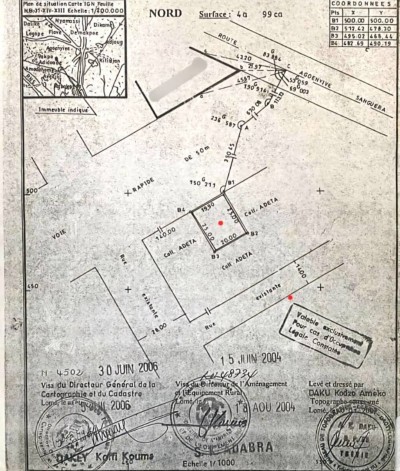 1 lot avec titre foncier en cours au bord de la voie express