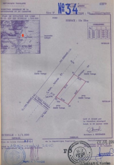 2 lots collés avec titre foncier au bord du goudron