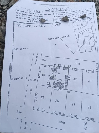 1 lot cloturé avec titre foncier à 100m du goudron