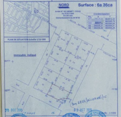 1 lot cloturé avec titre foncier global à 50m du goudron