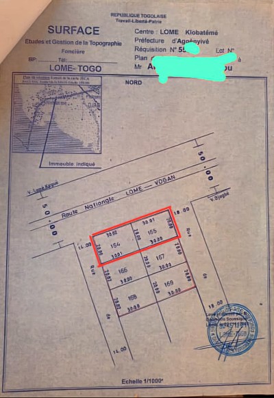 2 lots collés avec titre foncier en cours au bord du goudron