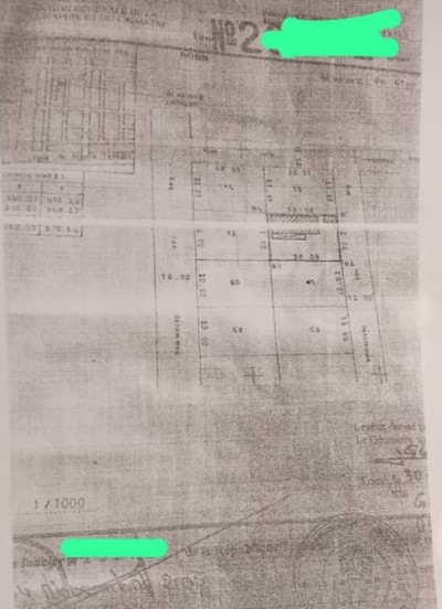 1 lot cloturé avec titre foncier comportant une vieille villa