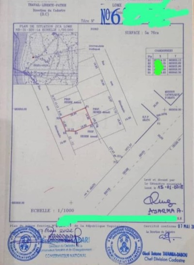 1 lot cloturé avec titre foncier à 200m du goudron